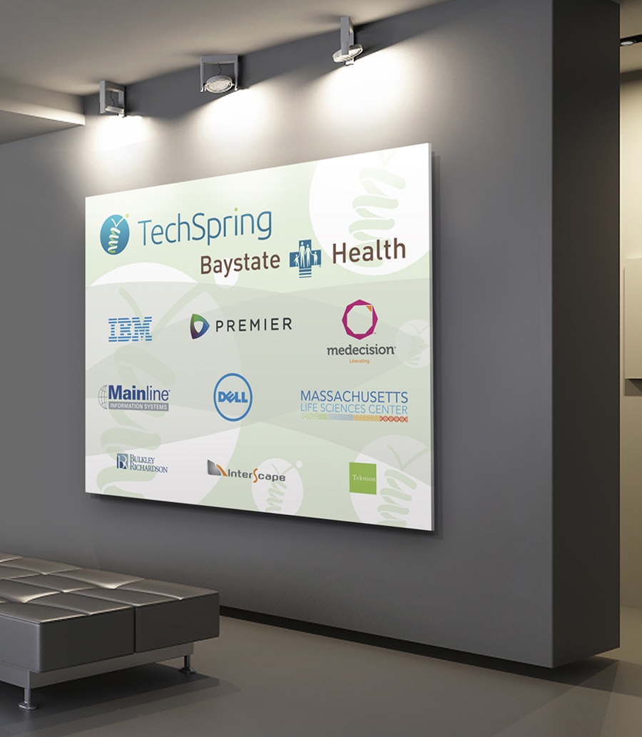 The TechSpring partner wall in the lobby, showing Baystate Health and founding partner logos